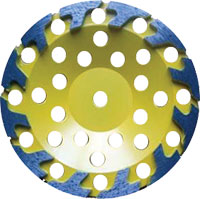 Yellow disk with dark, stylised t shaped grinders